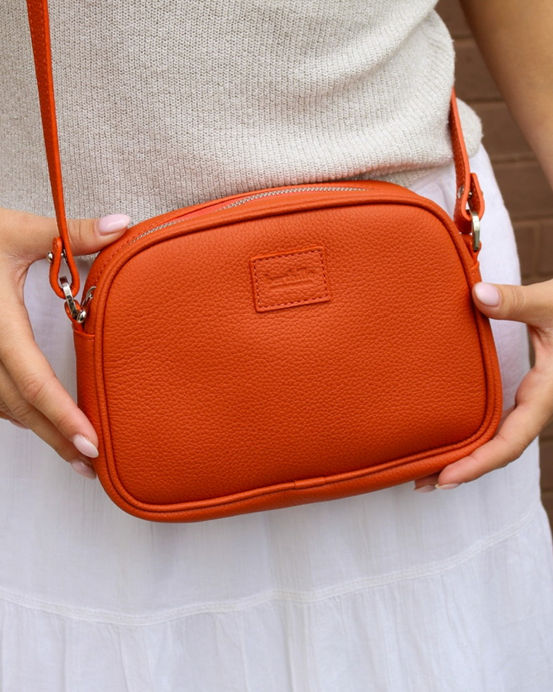 Minaudière cuir orange butano bandoulière Berthille
