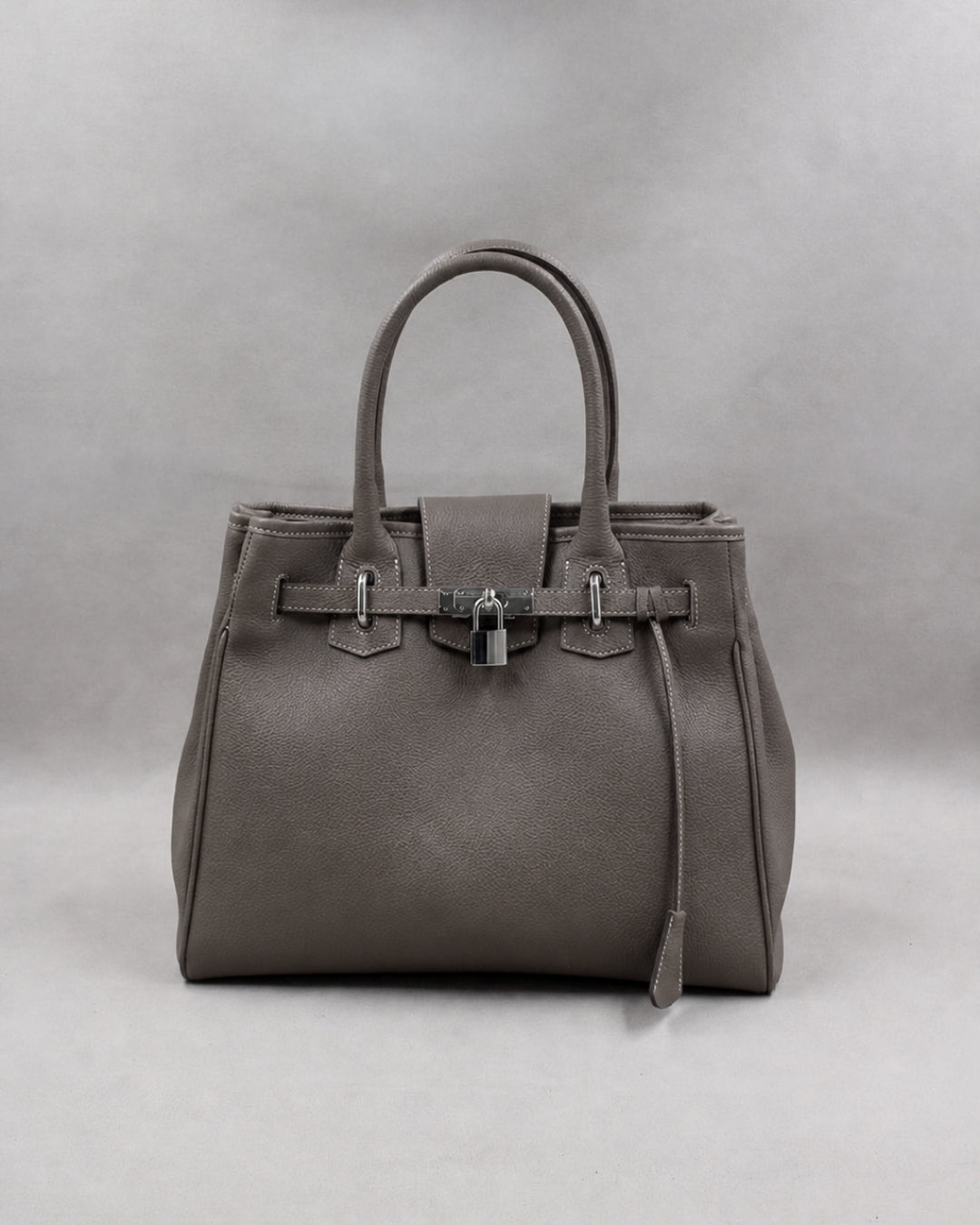 Sac Vendôme cuir havane fermoir cadenas maroquinerie Berthille